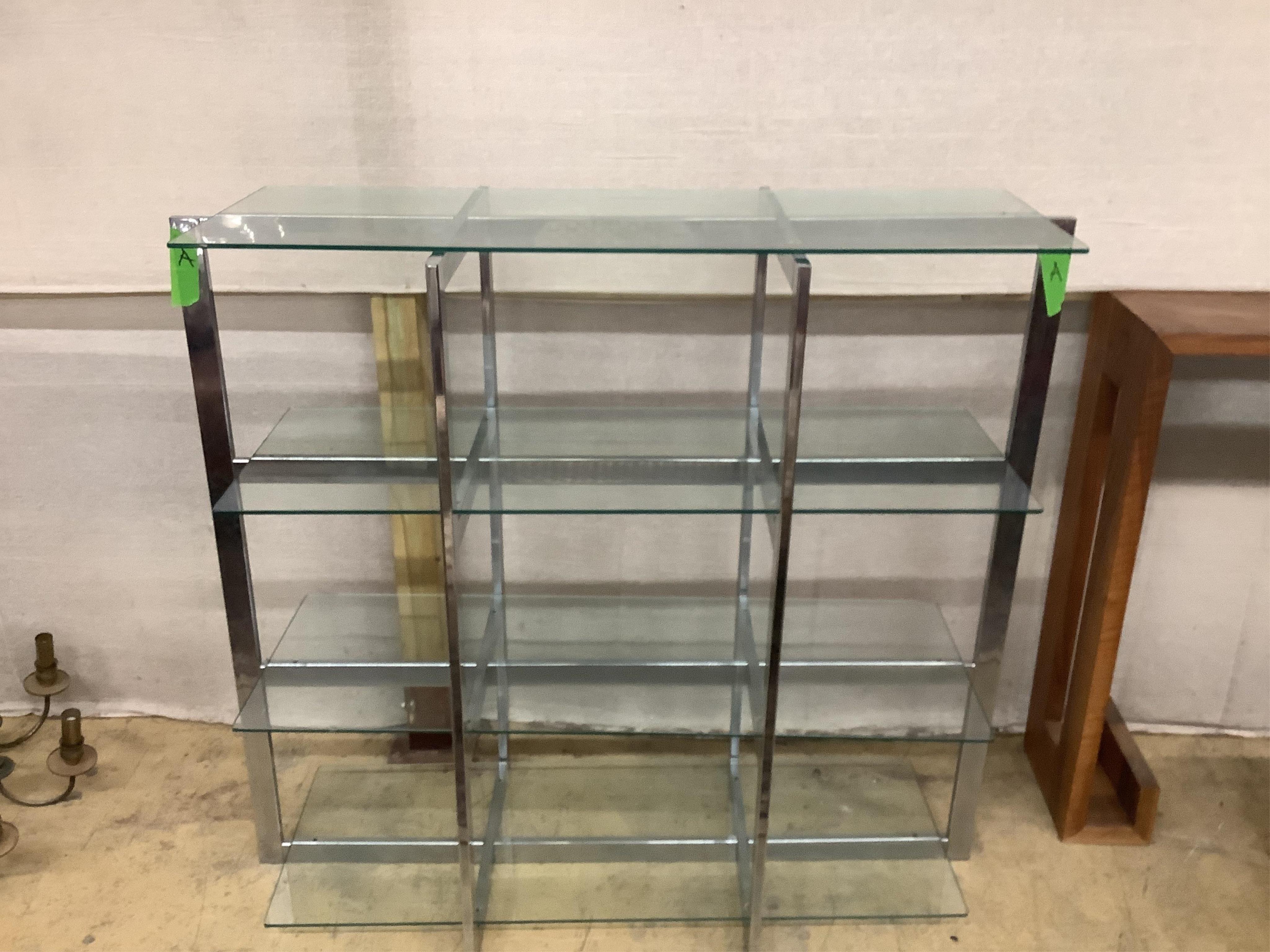 A 1920’s chrome and glass shelving unit, width 117cm, depth 48cm, height 107cm. Condition - good